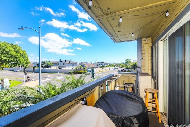 balcony featuring area for grilling