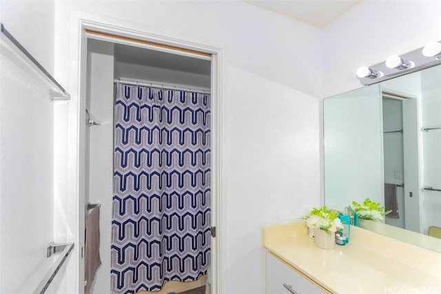 bathroom featuring vanity and a shower with curtain