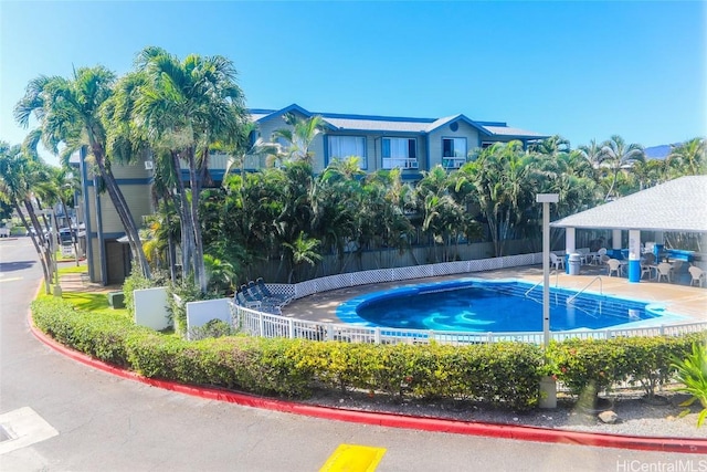 view of swimming pool with a gazebo