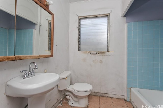 bathroom featuring tile patterned flooring, sink, and toilet