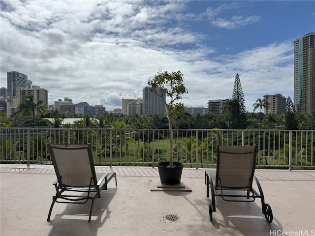 view of patio / terrace featuring a view of city