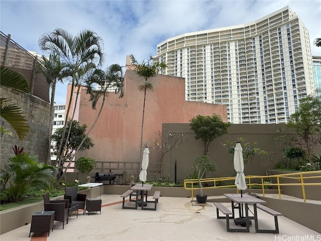 view of community with a patio