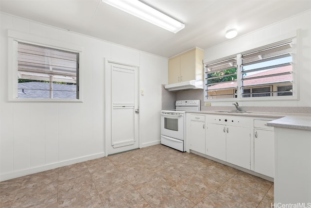 kitchen with white cabinetry, white electric range, sink, and a wealth of natural light