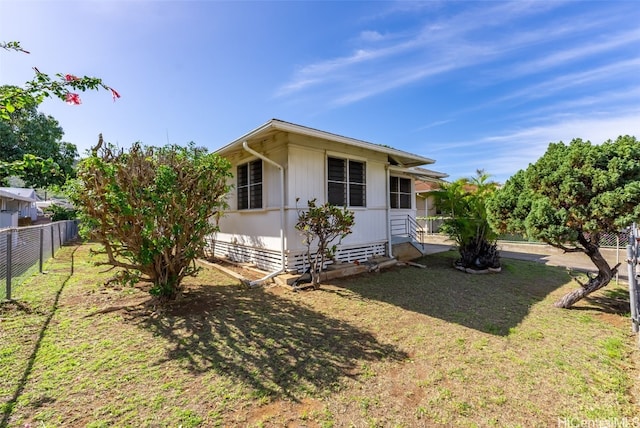 exterior space with a lawn