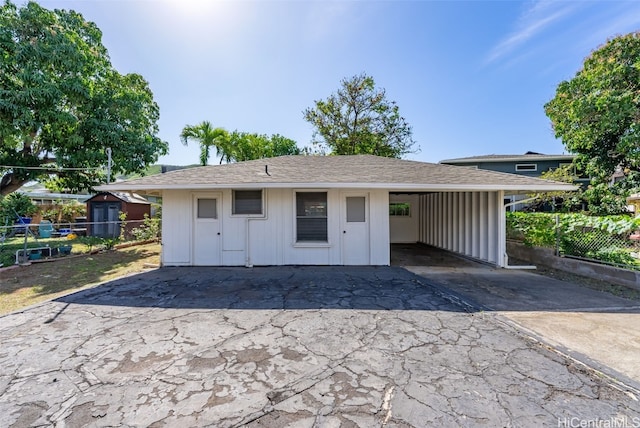 garage featuring a carport