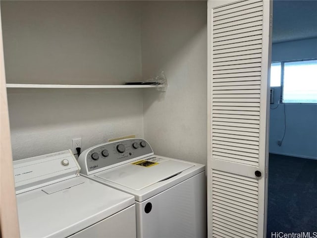 laundry room featuring separate washer and dryer