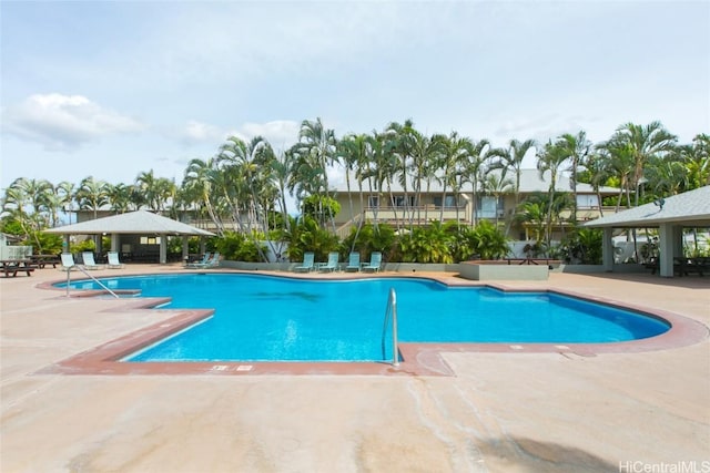 view of swimming pool featuring a gazebo and a patio area