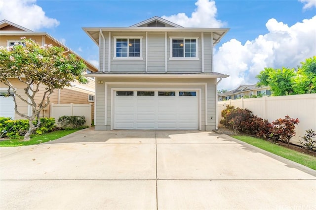 view of front of property with a garage