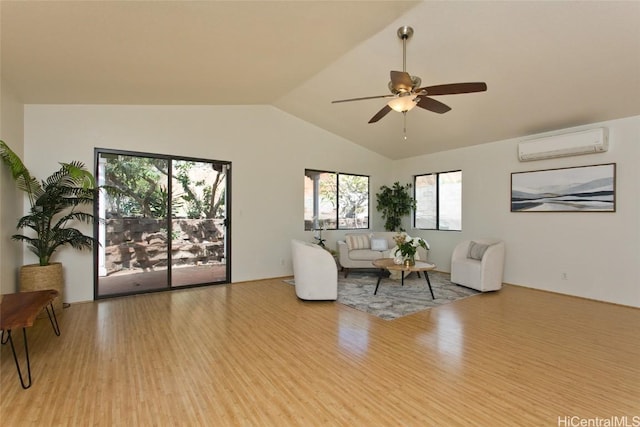 living room featuring ceiling fan, lofted ceiling, a wall mounted air conditioner, and light hardwood / wood-style floors