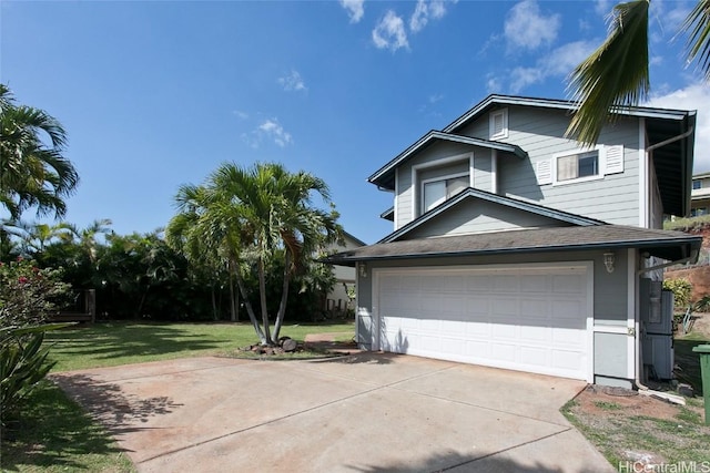 exterior space with a garage and a front yard