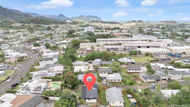 birds eye view of property featuring a mountain view