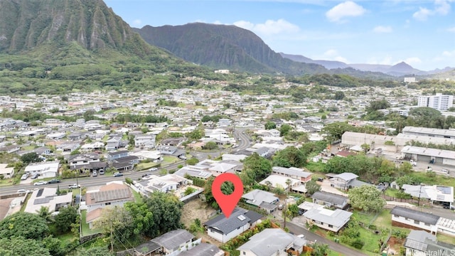 birds eye view of property with a mountain view