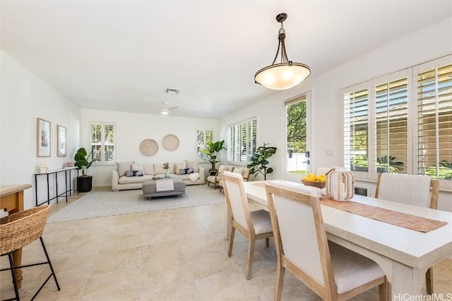 dining space featuring a healthy amount of sunlight