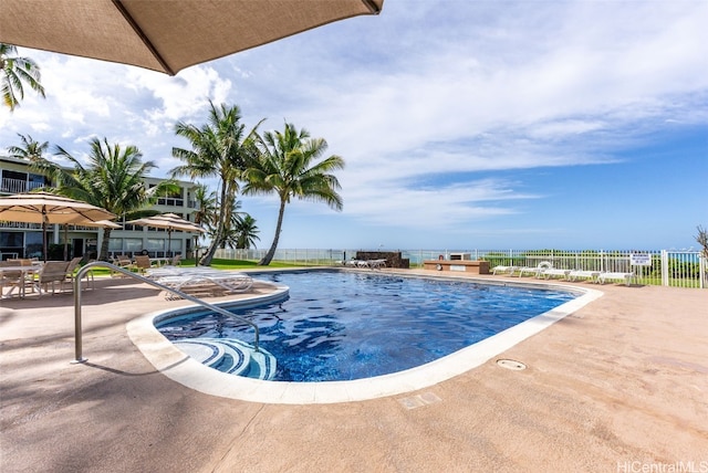 87-561 Farrington Hwy Unit 211, Waianae, HI 96792 - community pool featuring a patio