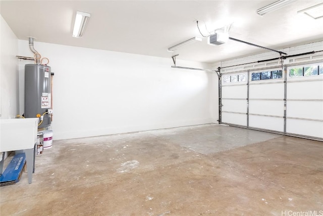 garage featuring a garage door opener and gas water heater