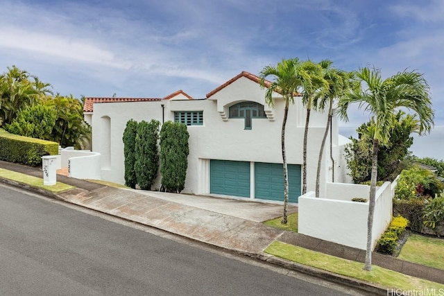 view of front of property featuring a garage