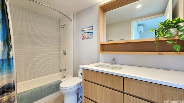 full bathroom featuring vanity, toilet, and tiled shower / bath