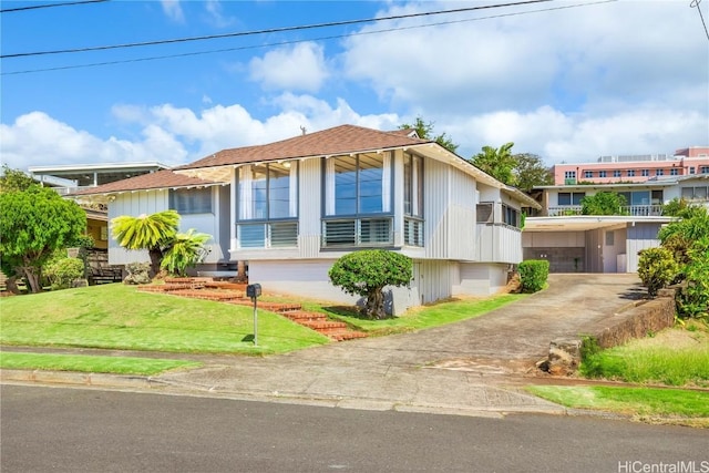 view of front of home with a front yard