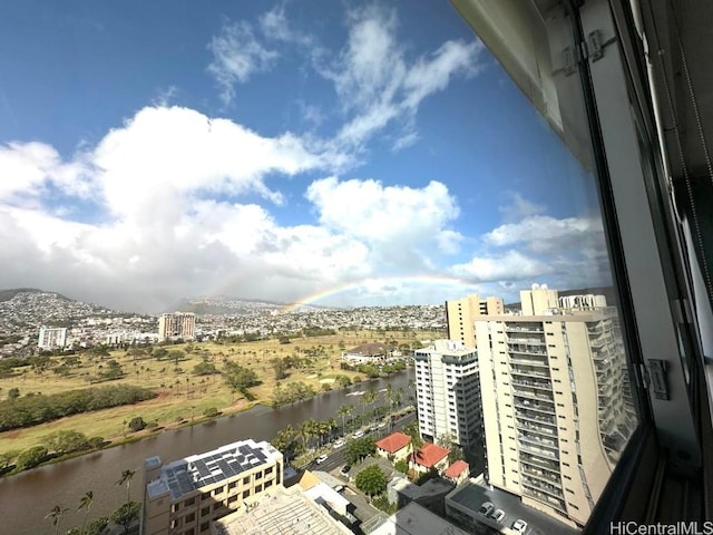 birds eye view of property with a water view