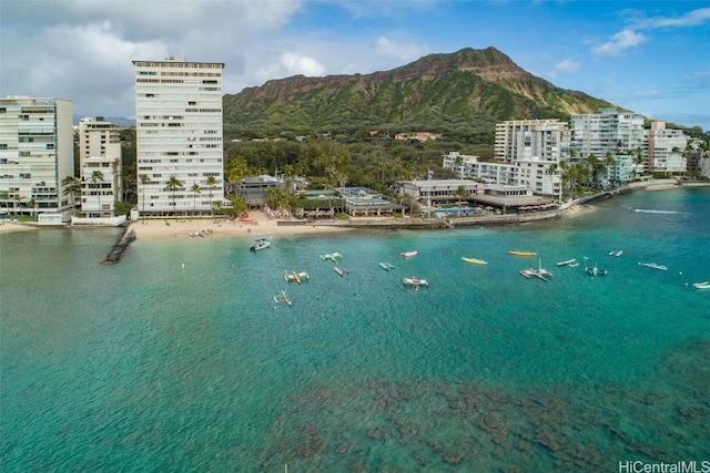 property view of water featuring a view of city and a mountain view