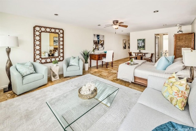 living room with a ceiling fan and recessed lighting