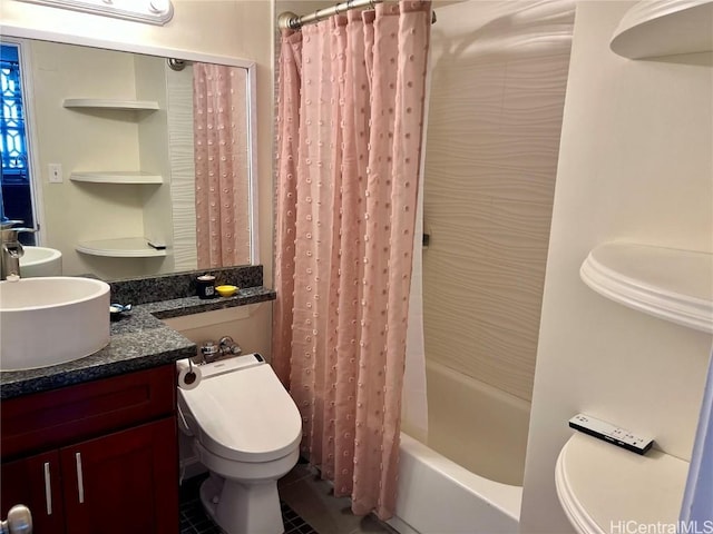 full bathroom with vanity, toilet, and shower / bath combo