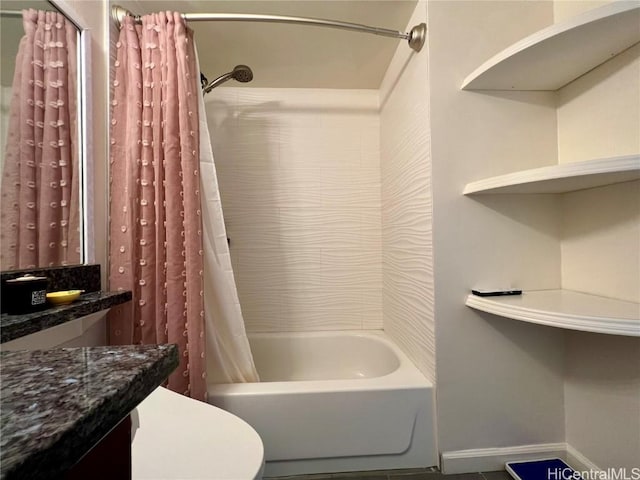 bathroom with shower / tub combo with curtain and toilet