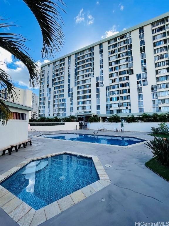 view of pool featuring a patio area