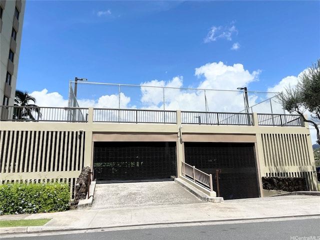 3050 Ala Poha Pl Unit W2, Honolulu, HI 96818 - view of front of property featuring a garage