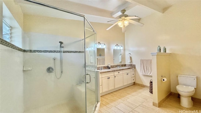 bathroom with vanity, an enclosed shower, ceiling fan, and toilet