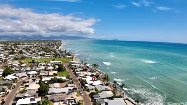 bird's eye view with a water and mountain view