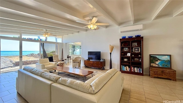 living room with a water view, a wall mounted AC, ceiling fan, and light tile patterned floors