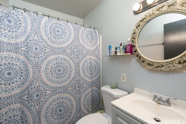 bathroom with vanity and toilet