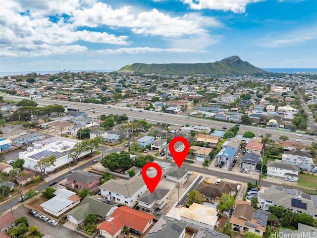 drone / aerial view featuring a mountain view