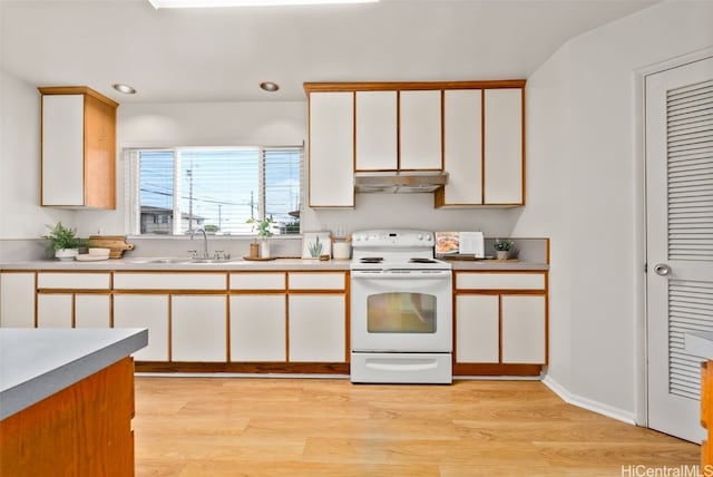 kitchen featuring sink, light wood-type flooring, white cabinets, and white range with electric cooktop