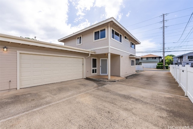 front of property featuring a garage