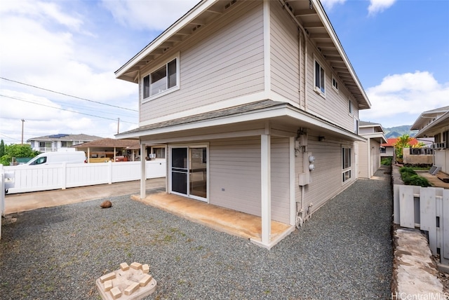 back of property featuring a patio area