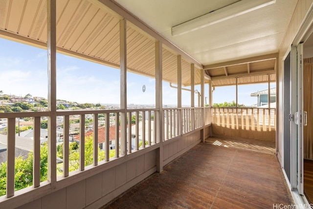 unfurnished sunroom featuring plenty of natural light