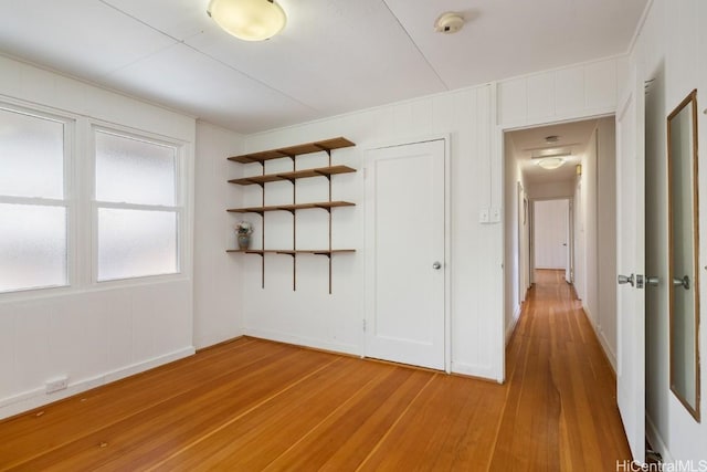 spare room featuring light wood-style floors