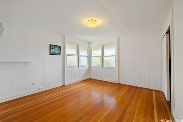 spare room featuring light wood-style floors