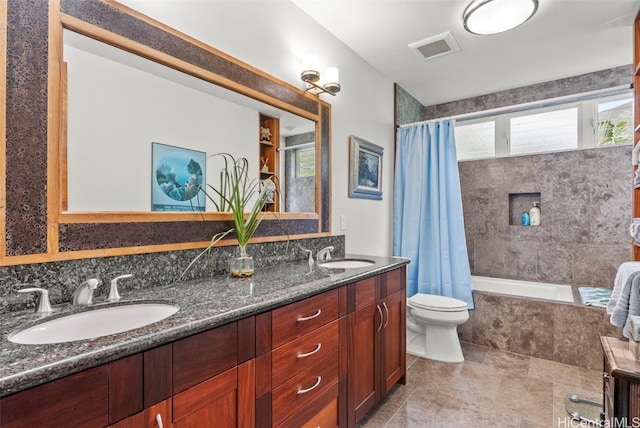 full bathroom with toilet, vanity, and shower / bathtub combination with curtain