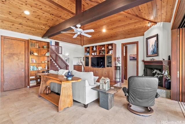 living room with lofted ceiling with beams, wooden ceiling, and ceiling fan