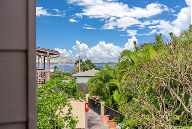 view of home's community with a water view