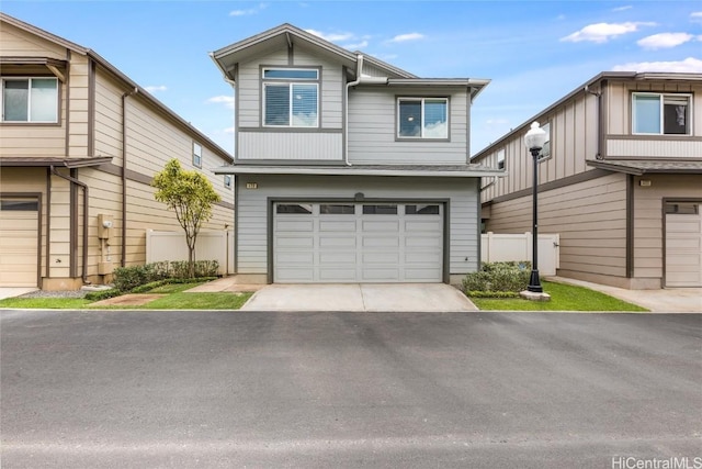 view of front of property with a garage