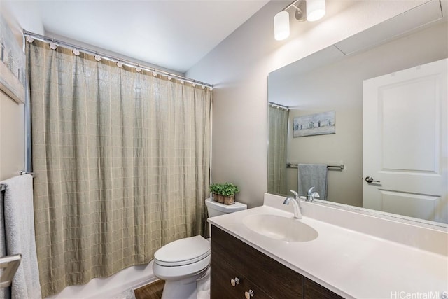 full bathroom with vanity, shower / bath combination with curtain, and toilet