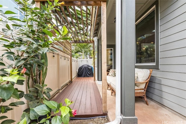 wooden terrace with a patio