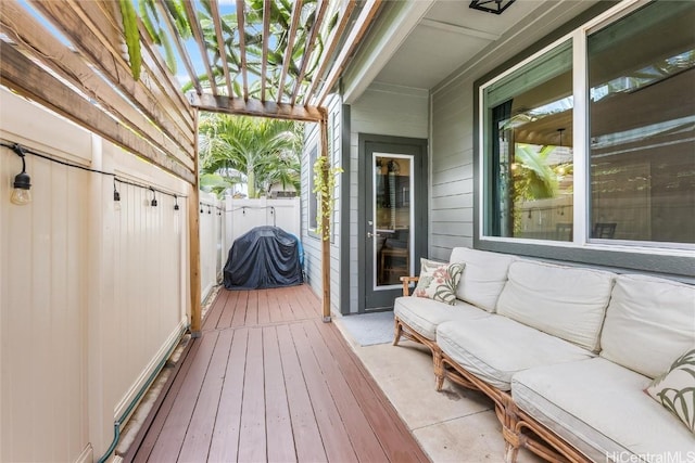 wooden terrace featuring a pergola