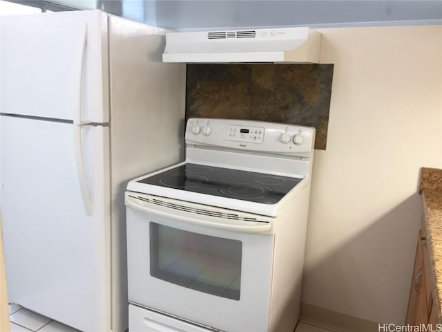 kitchen featuring white appliances