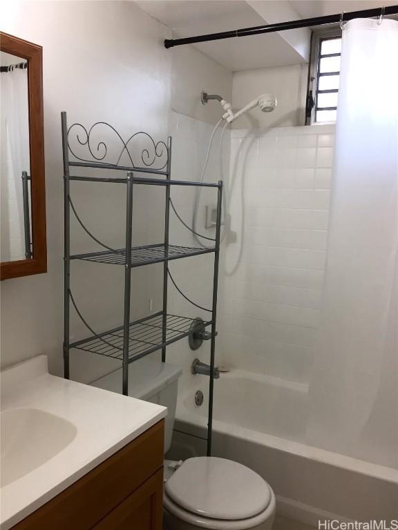 full bathroom with vanity, bathtub / shower combination, and toilet