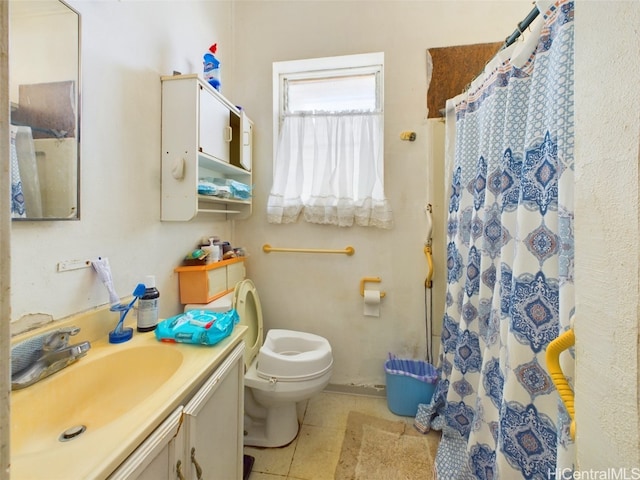 bathroom with tile patterned flooring, vanity, toilet, and a shower with shower curtain